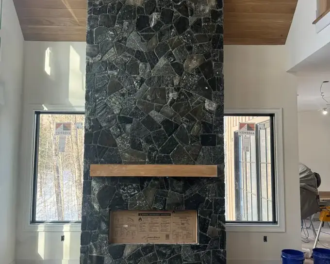 Stone Fireplace in Massachusetts by Br Construction Corp