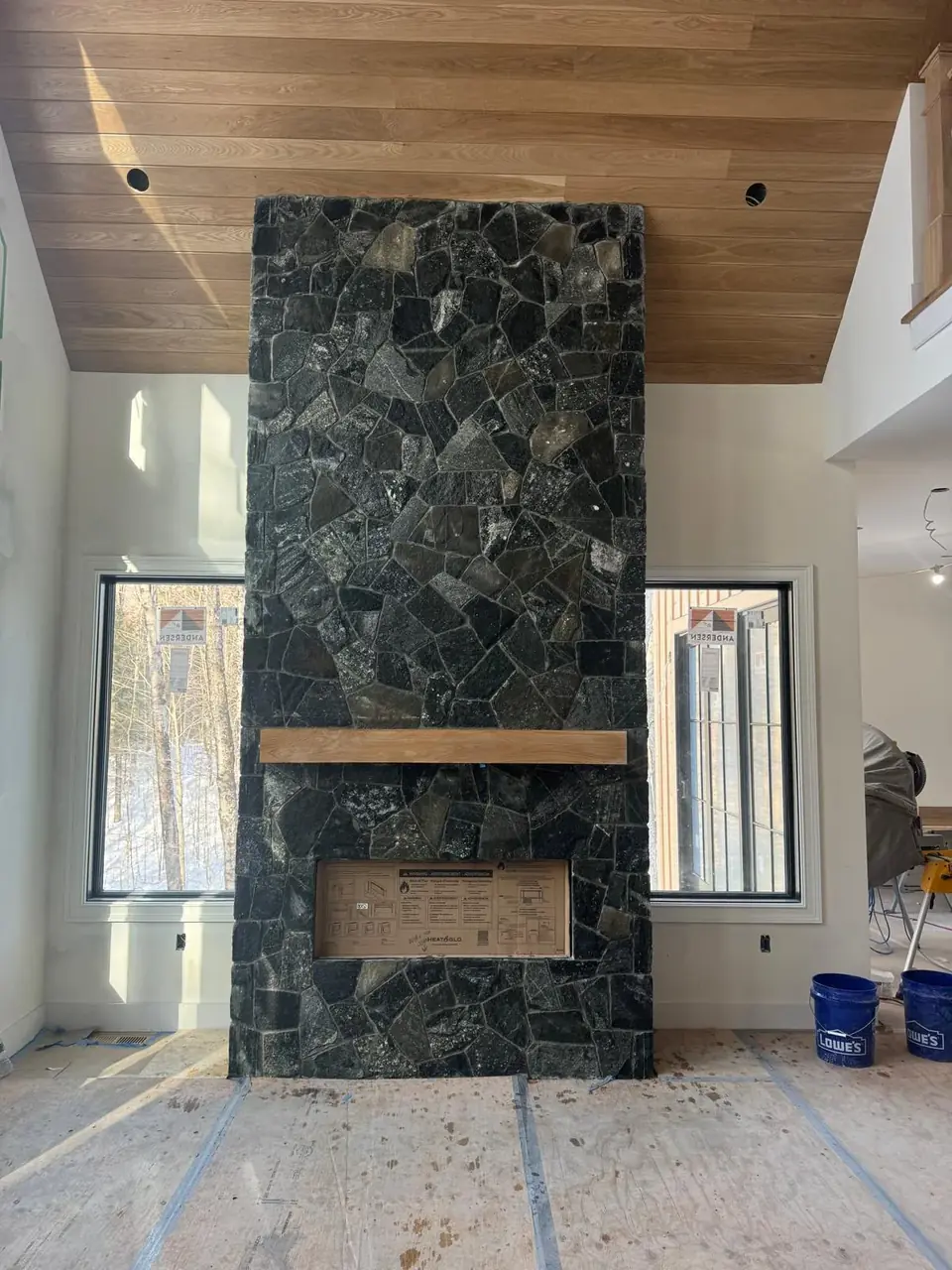 Stone Fireplace in Massachusetts by Br Construction Corp